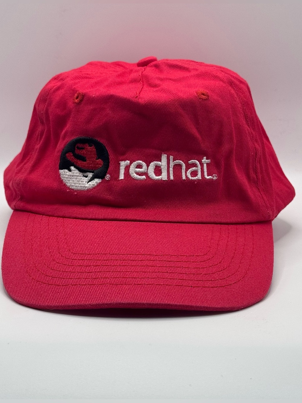 Red Hat Linux Strapback Adjustable Baseball Style Cap w/the "Shadowman" logo
